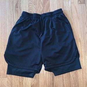 Athletic shorts with built in compression shorts
